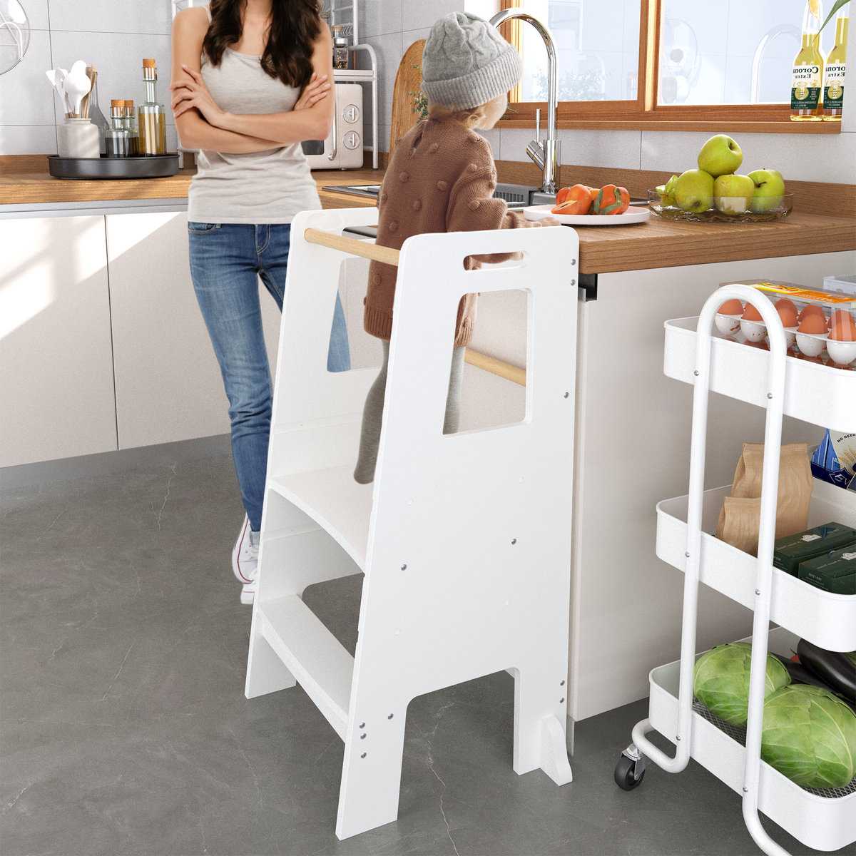 Toddler at the kitchen counter in the white Lovelyz learning tower