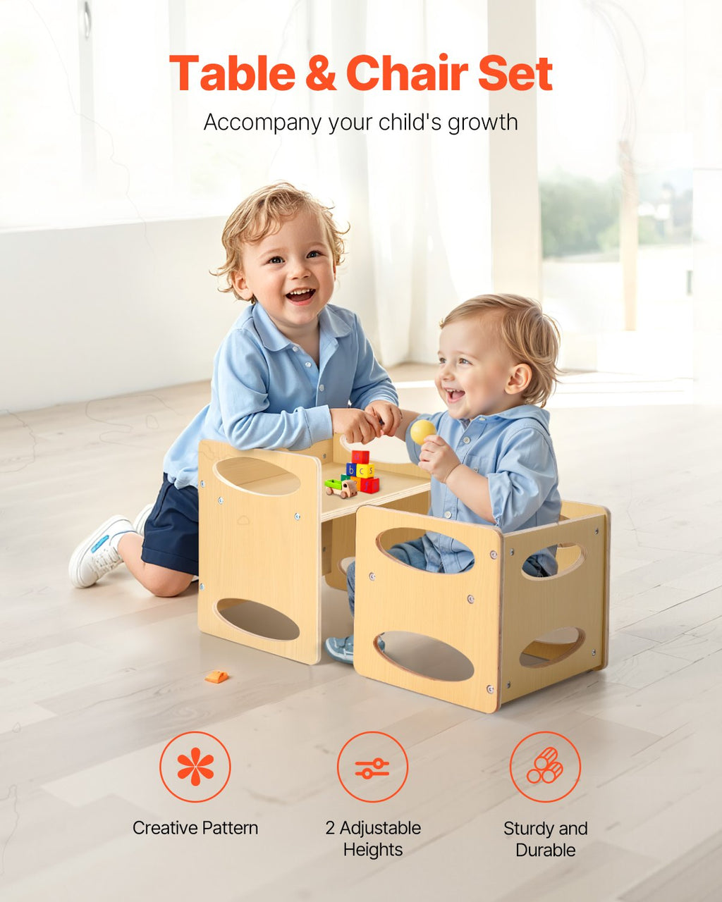 Two toddlers playing at the Montessori wooden table and chair set