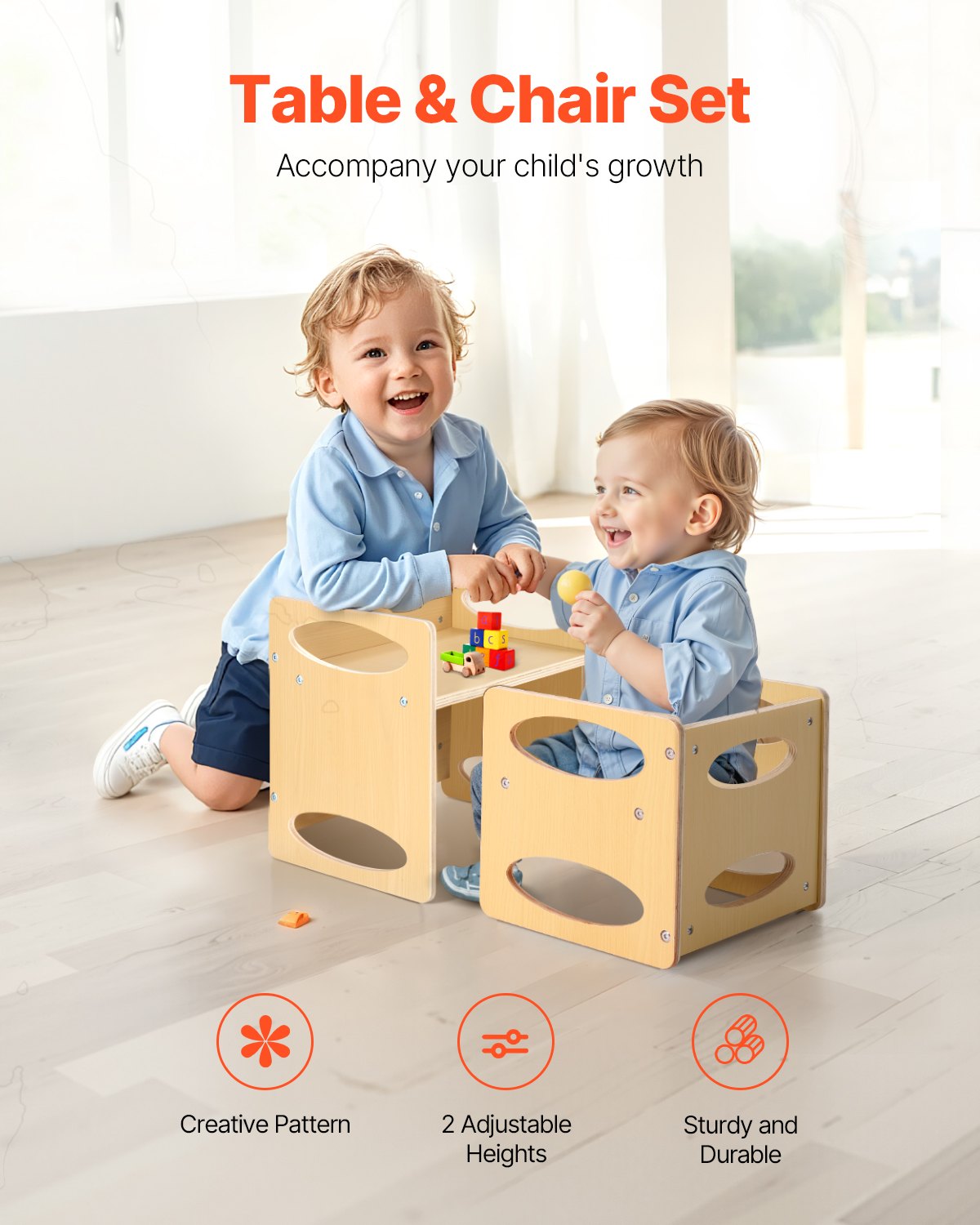 Two toddlers playing at the Montessori wooden table and chair set